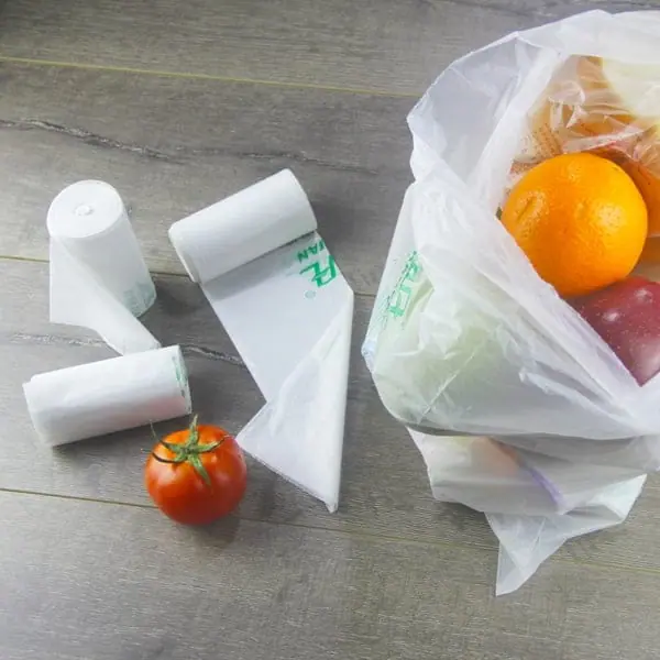 Disposable transparent plastic bag on roll